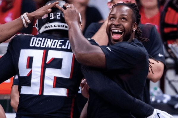 the Atlanta Falcons players celebrating at a game